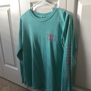 Turquoise long sleeve rainforest cafe tee